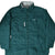 Front of dark green Nike reversible windbreaker with white chest Swoosh and zip pockets