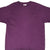 Front detail of purple Nike T-shirt with small dark Swoosh embroidery