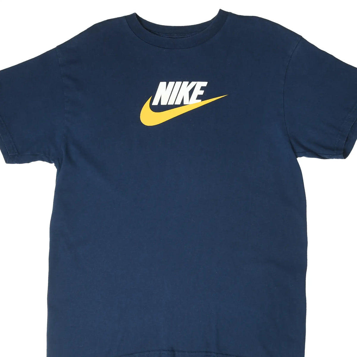 Upper front of navy Nike T-shirt with white spellout logo and yellow Swoosh graphic