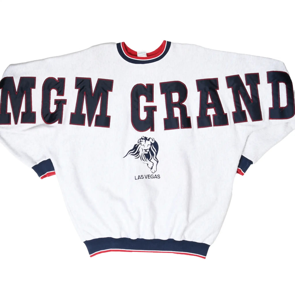 Front of white MGM Grand Las Vegas sweatshirt with navy lettering and lion embroidery