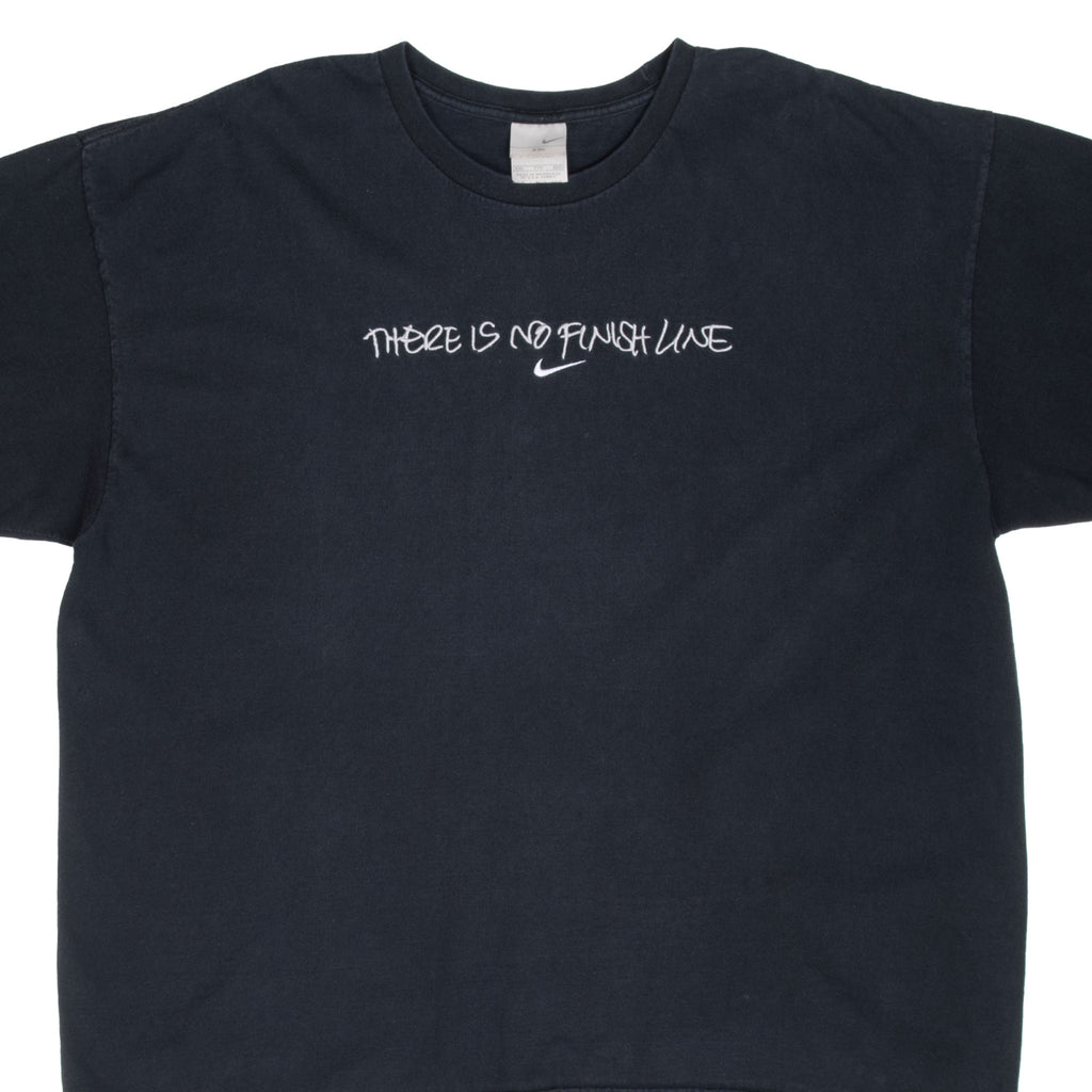 Upper front of black Nike T-shirt with white There Is No Finish Line embroidery and Swoosh