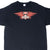 Upper front of black Aerosmith T-shirt with red and white winged horned skull graphic