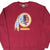 Front close-up of burgundy Washington Redskins sweatshirt with large team logo graphic