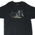 Front of black Harley-Davidson T-shirt with motorcycle and orange flame logo graphic