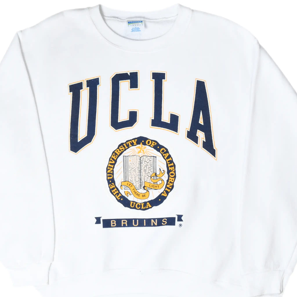 Front of white UCLA Bruins sweatshirt with navy and gold university seal graphic