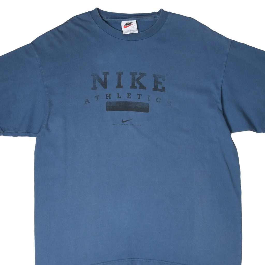 Close front view of blue-grey Nike T-shirt with black Nike Athletics chest print