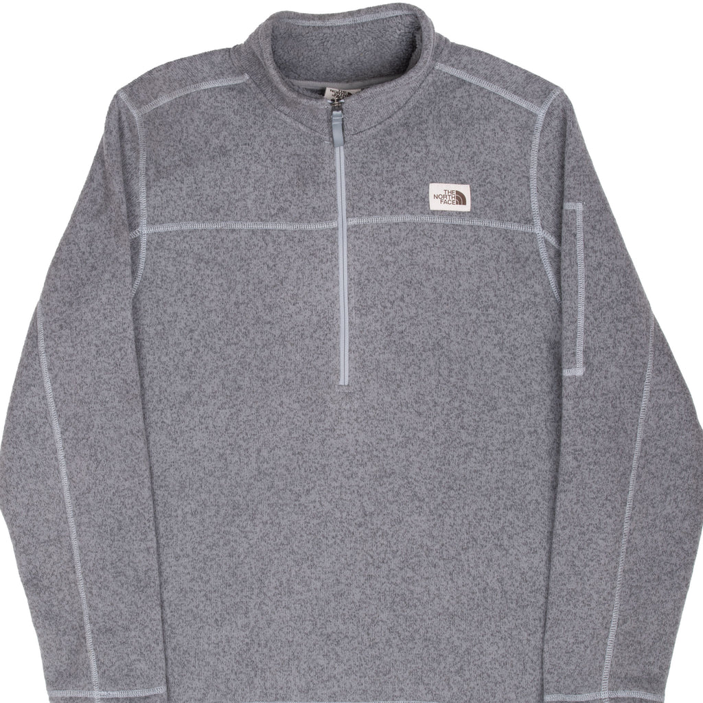 Front upper view of The North Face Gordon Lyons grey quarter-zip jacket