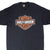 Front of black Harley-Davidson T-shirt with orange and white shield logo