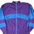 Front of purple and blue Nike International zip-up windbreaker jacket