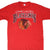 Front of red Chicago Blackhawks T-shirt with team name and head logo graphic