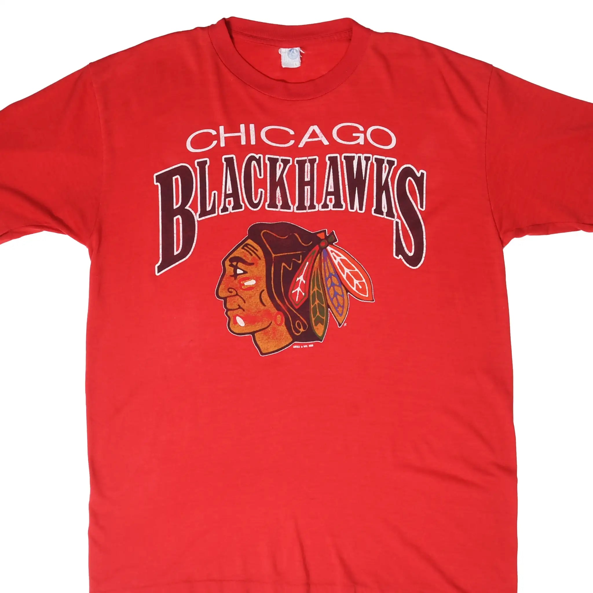 Front of red Chicago Blackhawks T-shirt with team name and head logo graphic