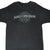 Front of black Harley-Davidson T-shirt with turquoise, white, and tan Motor Cycles logo