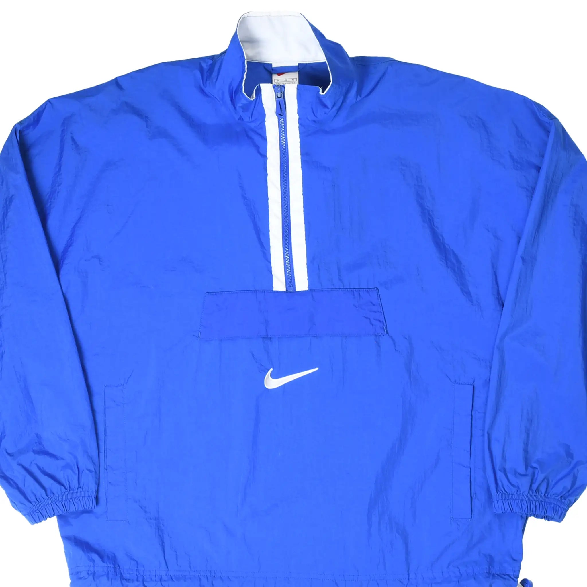 Front of blue Nike pullover windbreaker with white quarter zip and Swoosh pocket