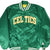 Front of green Boston Celtics Starter satin bomber jacket with white and gold lettering