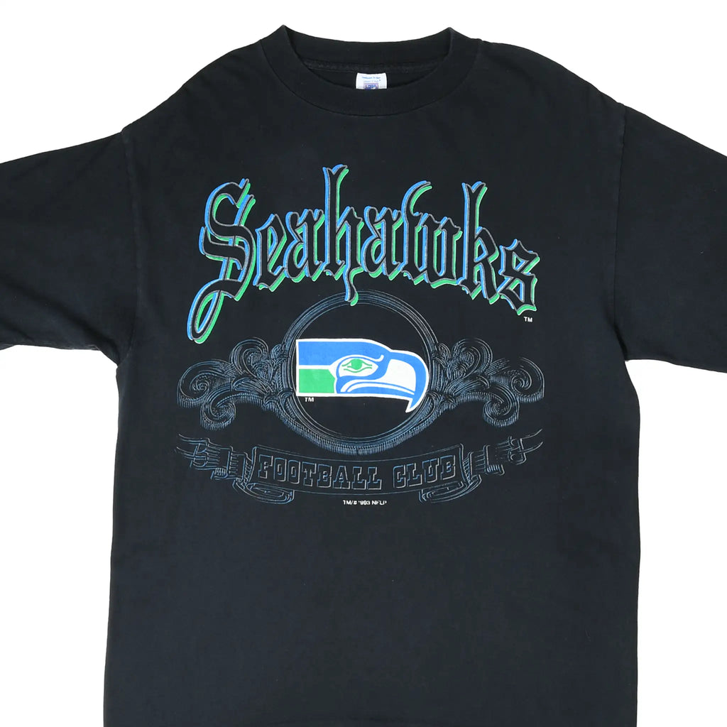 Front of black Seattle Seahawks NFL T-shirt with team logo and Football Club graphic