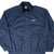 Front close view of navy Nike full-zip windbreaker with white embroidered Swoosh