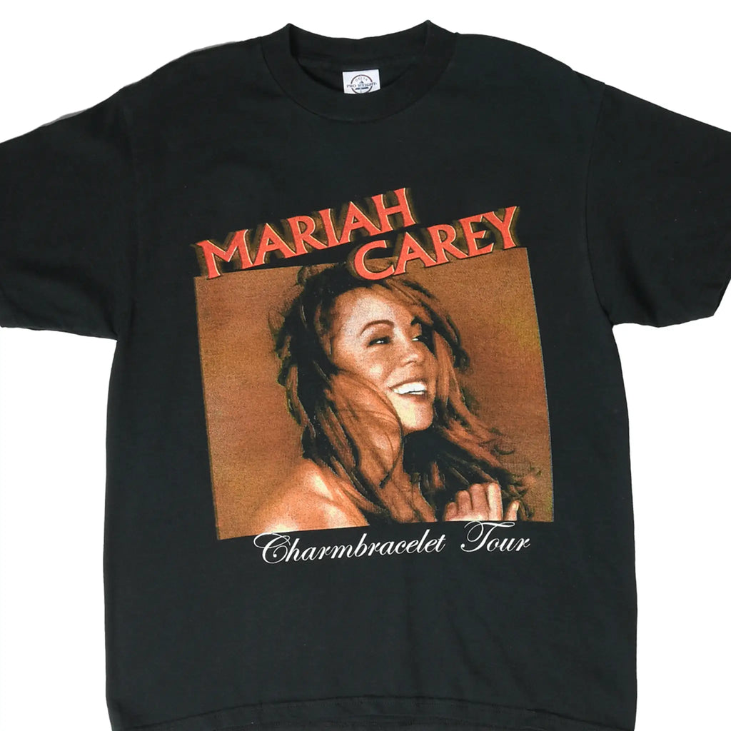 Front of black Mariah Carey Charmbracelet Tour T-shirt with large portrait graphic