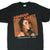 Front of black Mariah Carey Charmbracelet Tour T-shirt with large portrait graphic