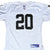 Front close-up of white Reebok Oakland Raiders jersey with black number 20