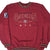 Front of burgundy San Francisco 49ers sweatshirt with embroidered logo and striped trim