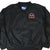 Front detail of black Chicago Bulls pullover windbreaker with embroidered chest logo