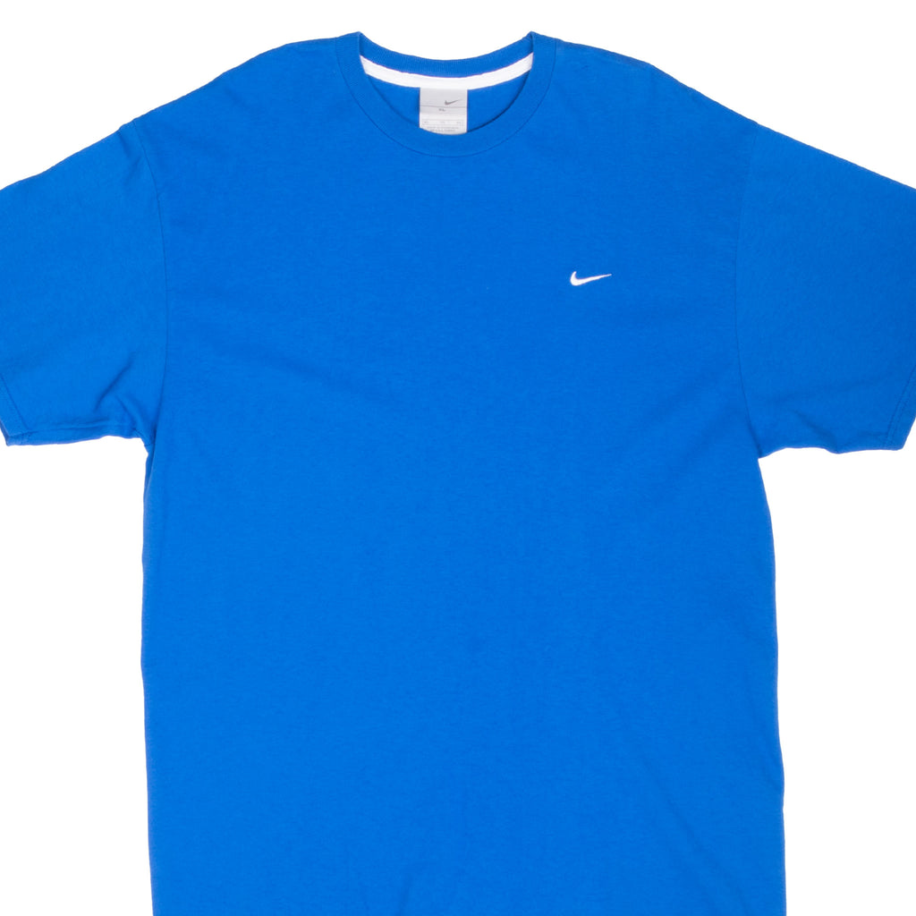 Front upper view of blue Nike crewneck T-shirt with white embroidered Swoosh at left chest