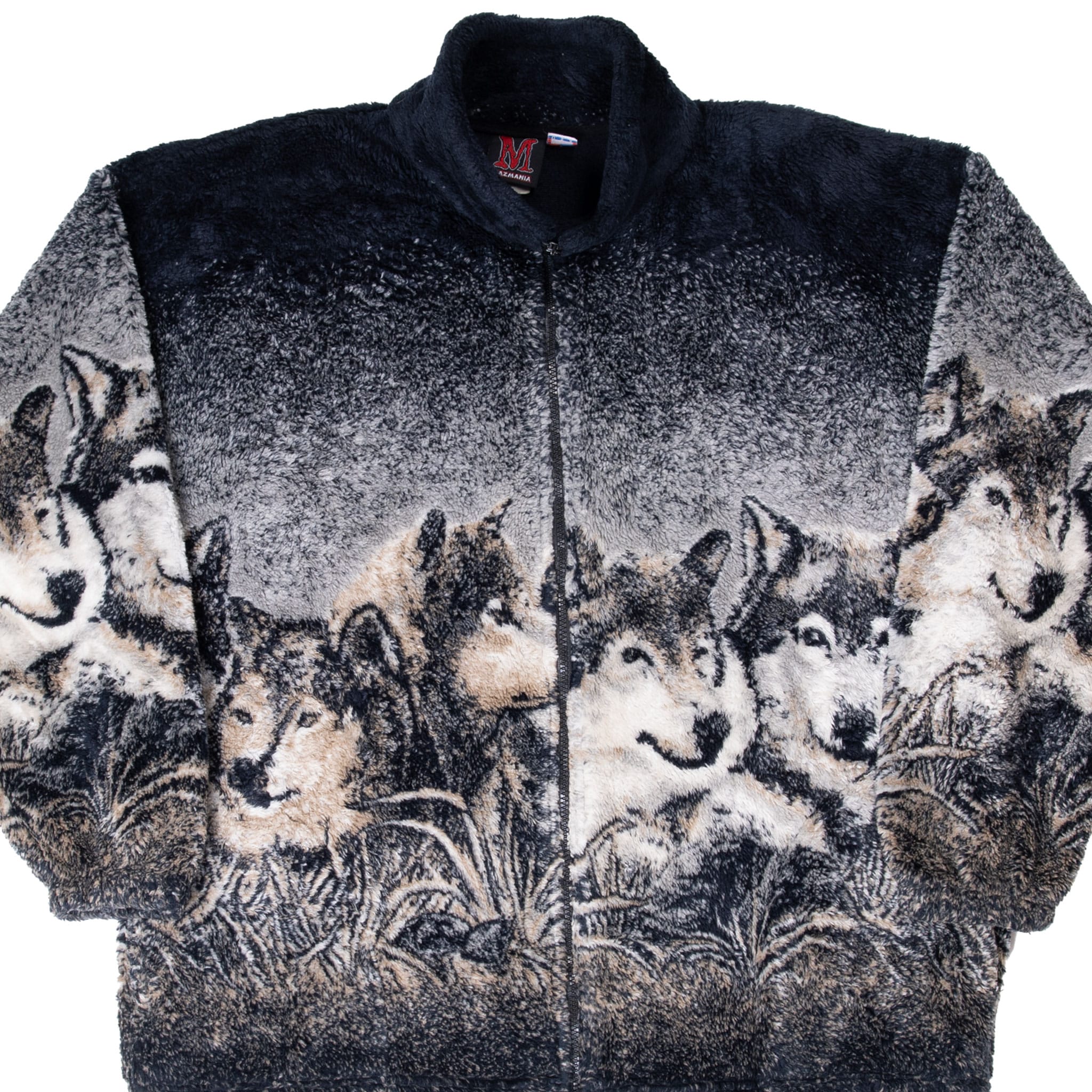 Front of Mazmania fleece jacket with wolf pack print in black, gray, cream and tan