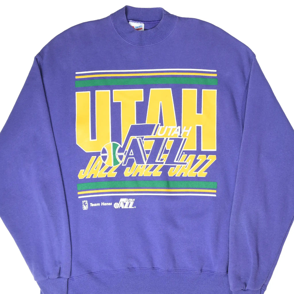 Front of purple Utah Jazz sweatshirt with oversized yellow, green and white team graphic
