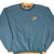 Front of sage green Nike sweatshirt with orange Swoosh embroidery and trim