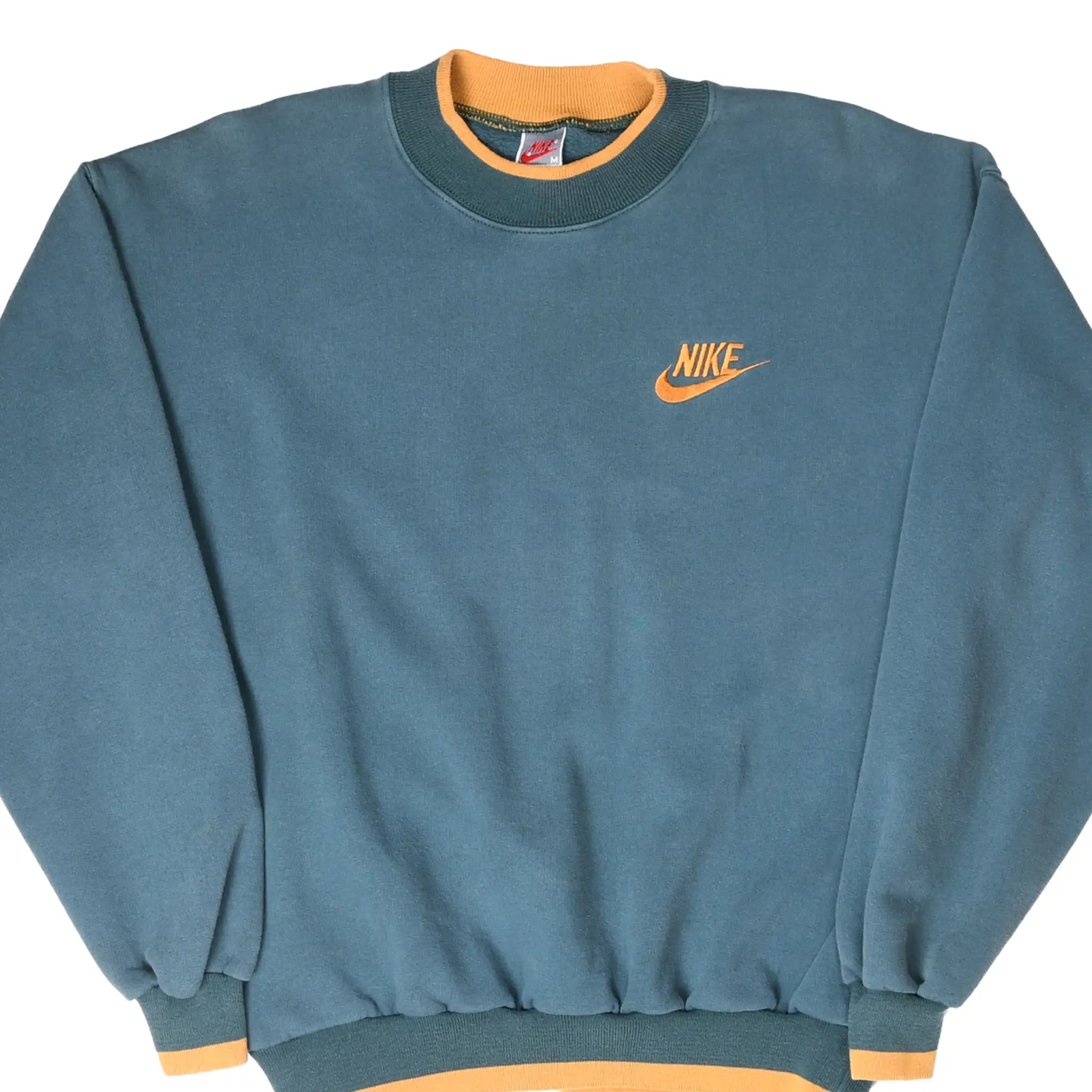 Front of sage green Nike sweatshirt with orange Swoosh embroidery and trim