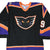 Front of black Philadelphia Phantoms Reebok hockey jersey with team logo and sleeve number 9