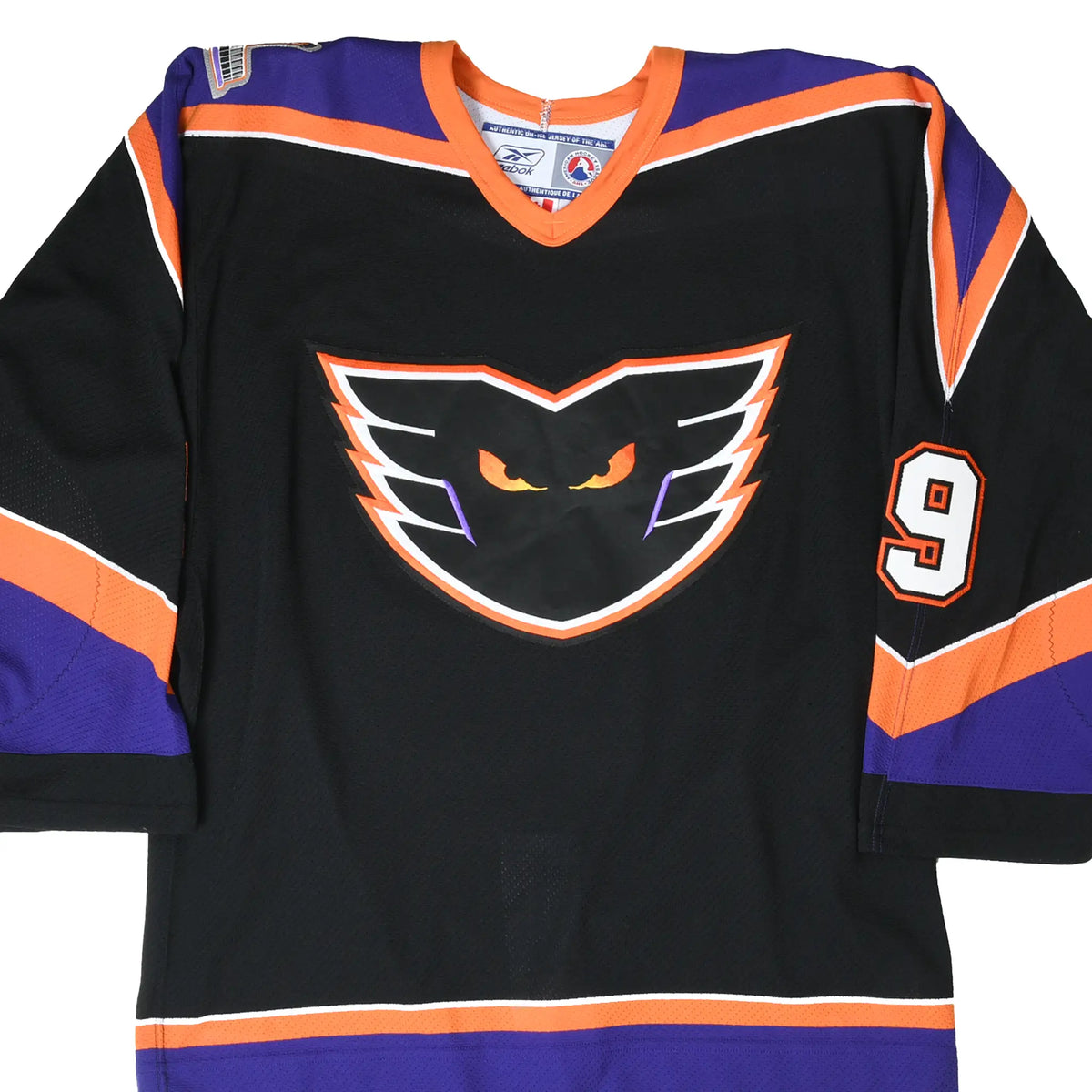 Front of black Philadelphia Phantoms Reebok hockey jersey with team logo and sleeve number 9