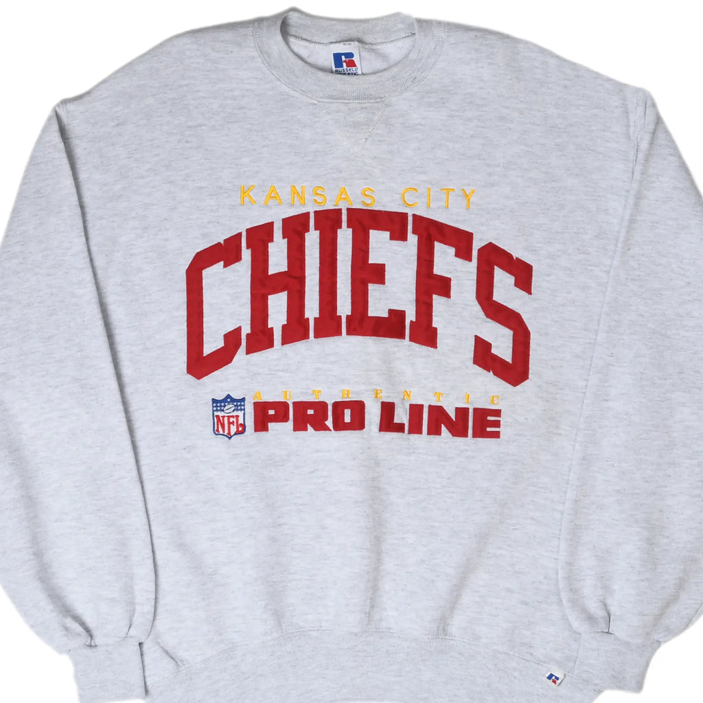 Front of gray Kansas City Chiefs sweatshirt with red and gold NFL Pro Line embroidery