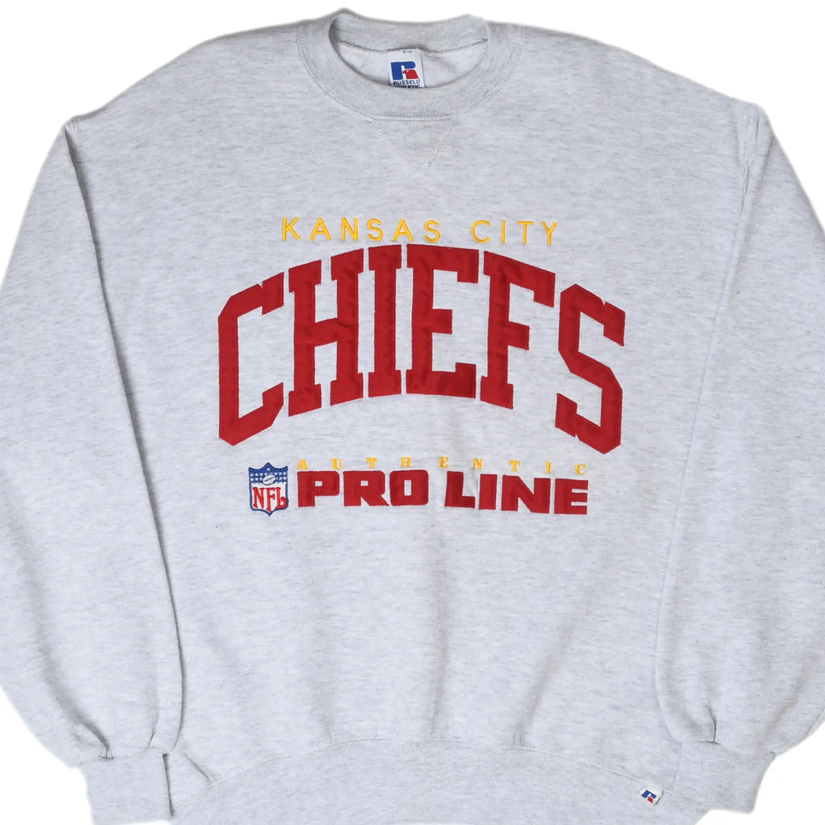 Front of gray Kansas City Chiefs sweatshirt with red and gold NFL Pro Line embroidery