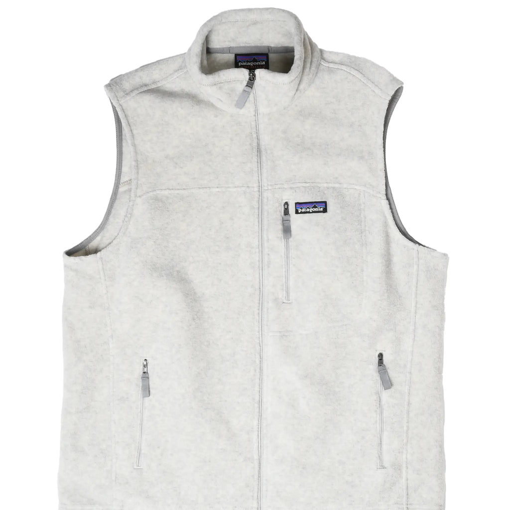 Front of beige Patagonia Synchilla fleece vest with full zip and three zip pockets