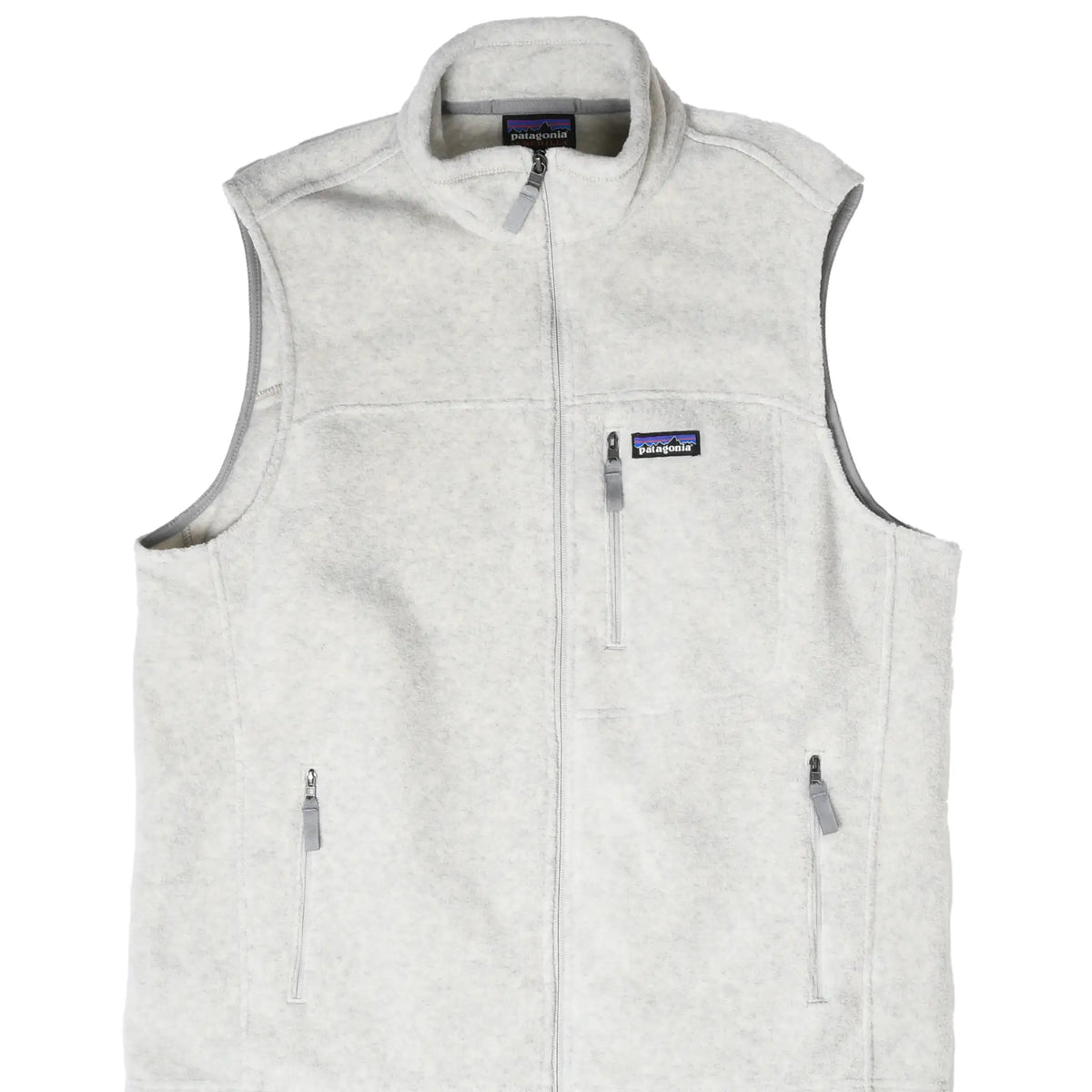 Front of beige Patagonia Synchilla fleece vest with full zip and three zip pockets