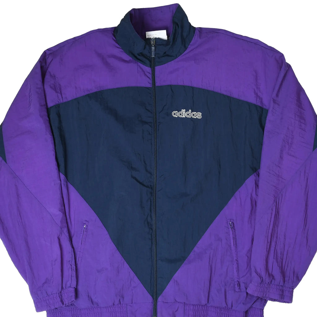 Front of purple and navy Adidas zip-up windbreaker with color-block design and embroidered chest logo