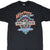 Front close-up of black Harley-Davidson T-shirt with orange, blue and white Hard Times graphic