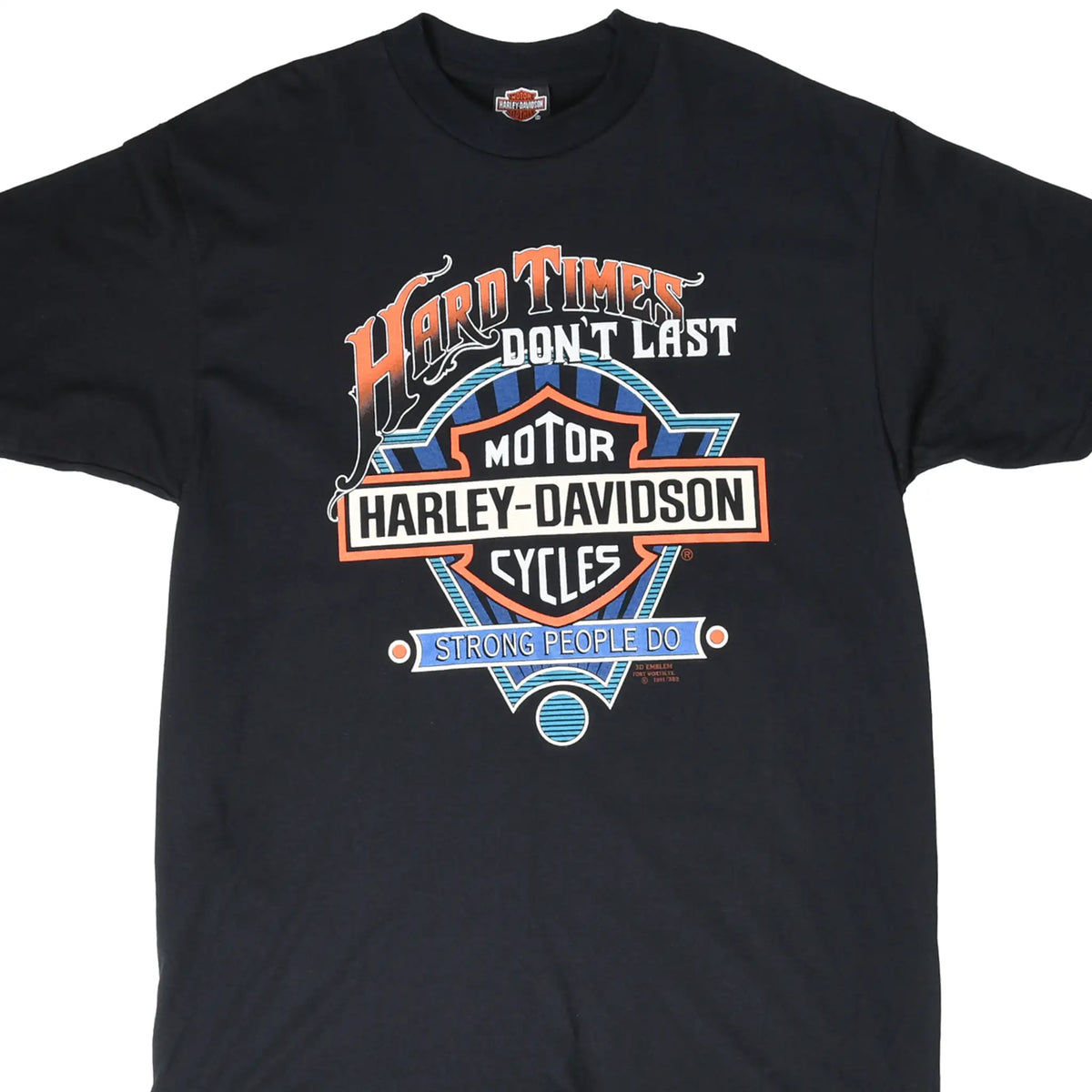 Front close-up of black Harley-Davidson T-shirt with orange, blue and white Hard Times graphic