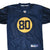 Front of navy Reebok NFL jersey with yellow circle and number 80 graphic