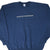 Front of navy Champion crewneck sweatshirt with Seattle University lettering