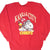 Front of red Kansas City Chiefs sweatshirt with Snoopy and Woodstock football graphic