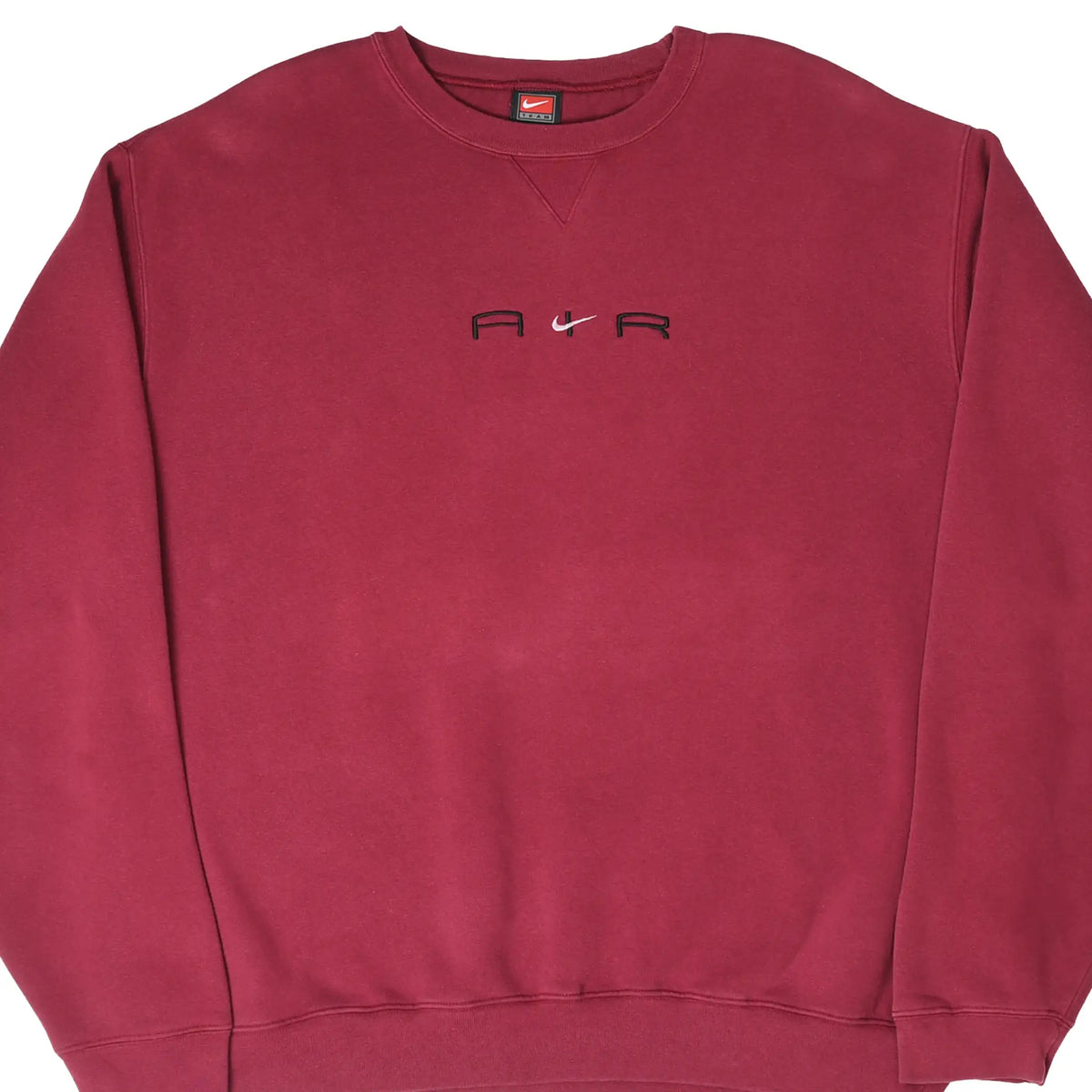 Front close-up of burgundy Nike Air crewneck with centered black lettering and white Swoosh