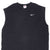 Front upper view of black Nike sleeveless T-shirt with white embroidered Swoosh