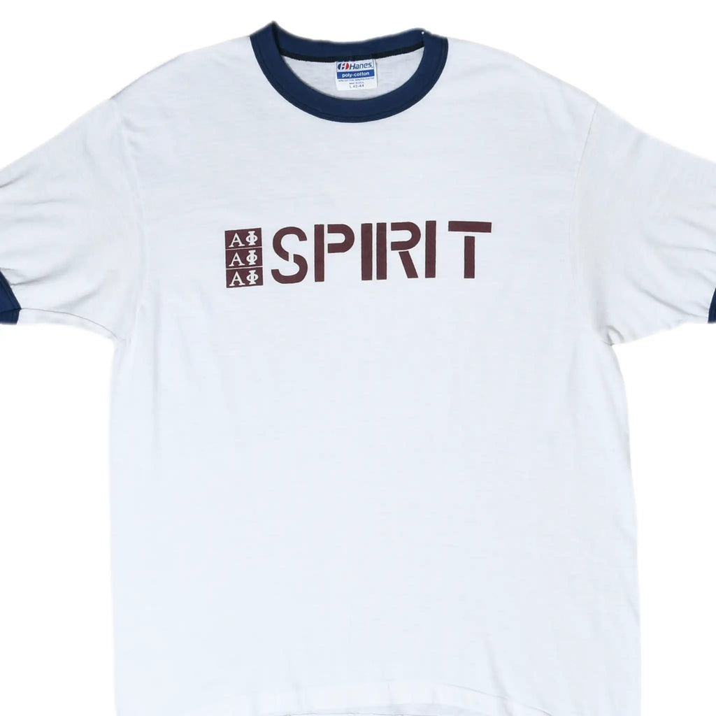 Cropped front of white ringer T-shirt with navy trim and burgundy Alpha Phi Spirit print