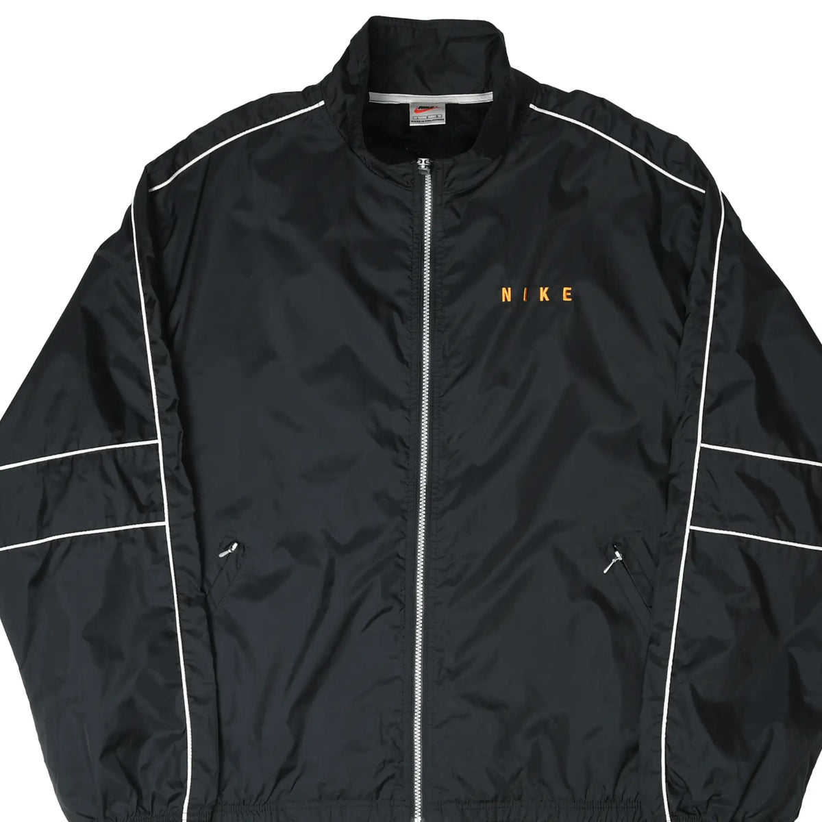 Close front view of black Nike windbreaker with orange chest embroidery, white piping, and zip pockets
