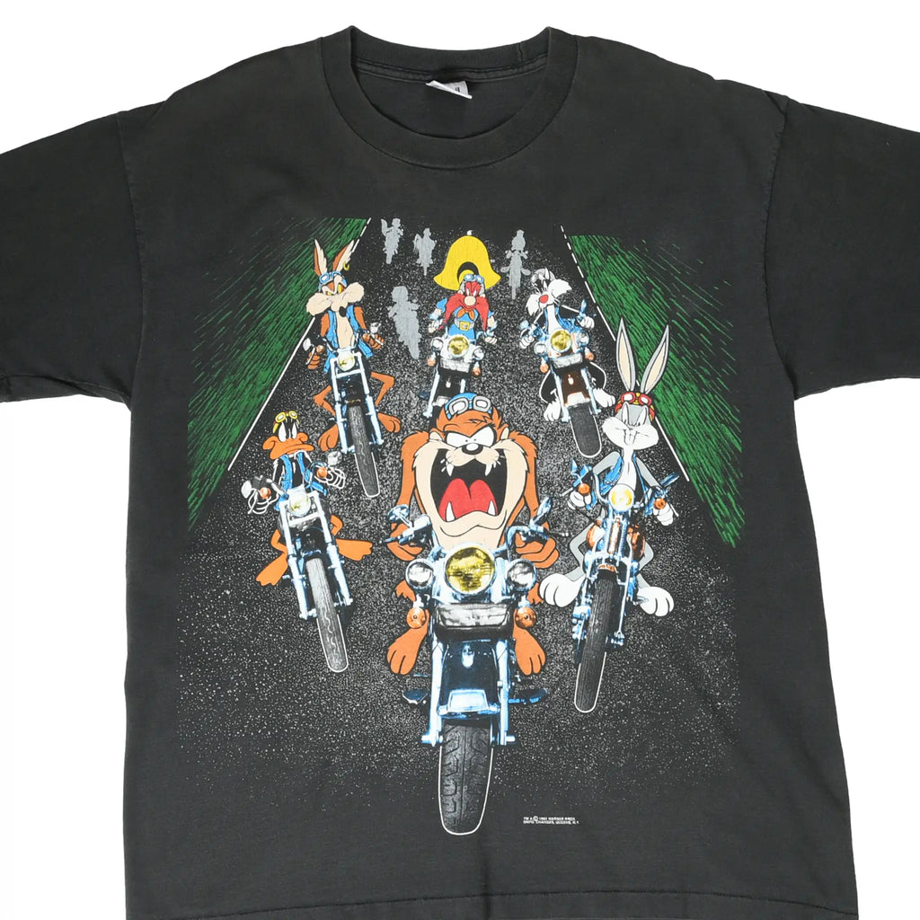 Front of black Looney Tunes T-shirt with Taz, Bugs Bunny and other characters riding motorcycles