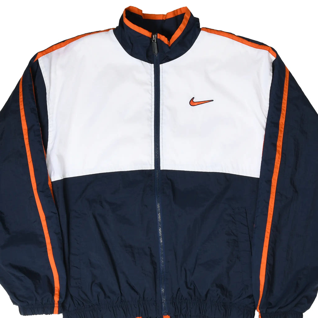 Front close-up of Nike windbreaker with navy, white and orange color blocking and embroidered Swoosh