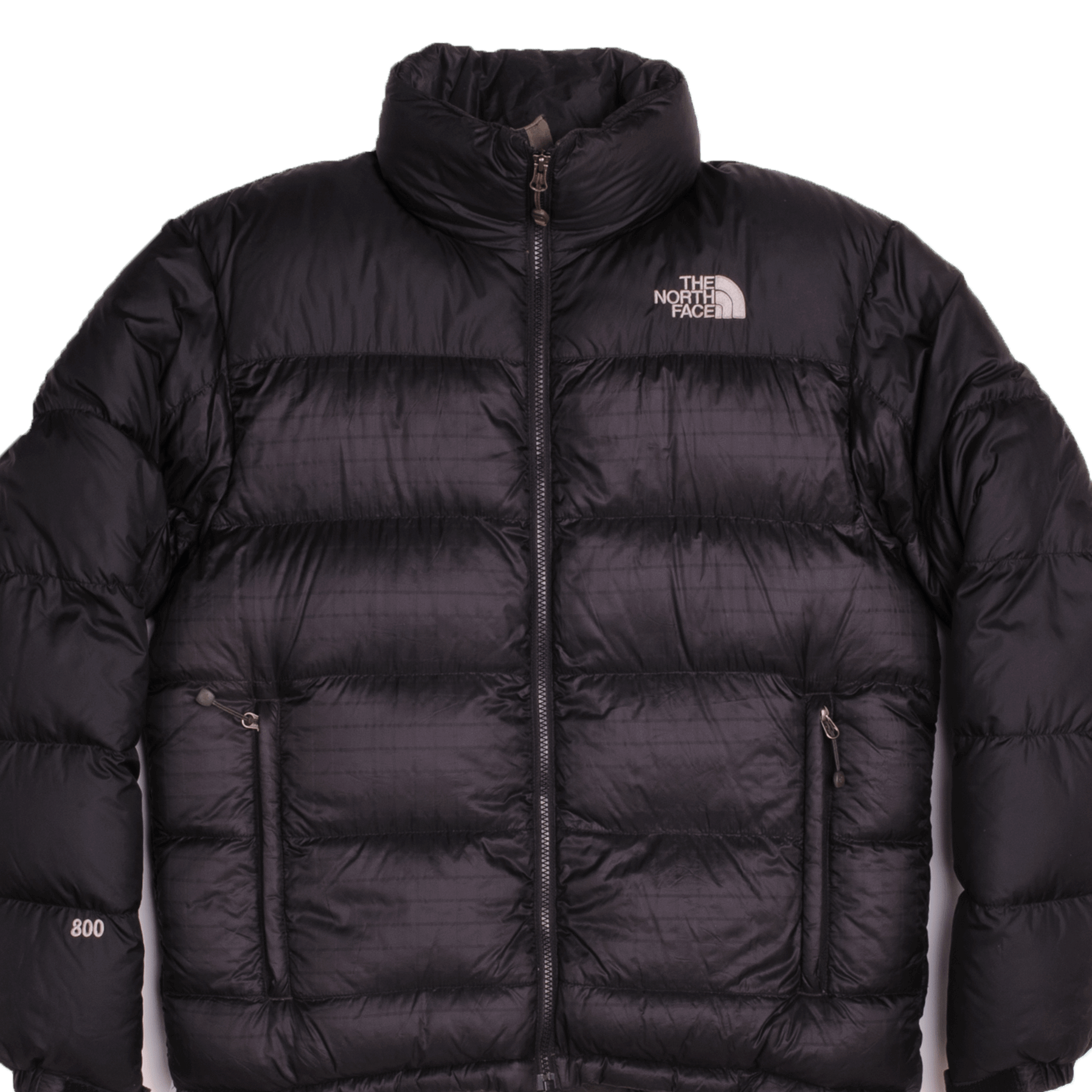 The moment you see the oversized baffles you know you're looking at the iconic Nuptse Jacket. This durable piece has lofty 800-fill down and a sleek.