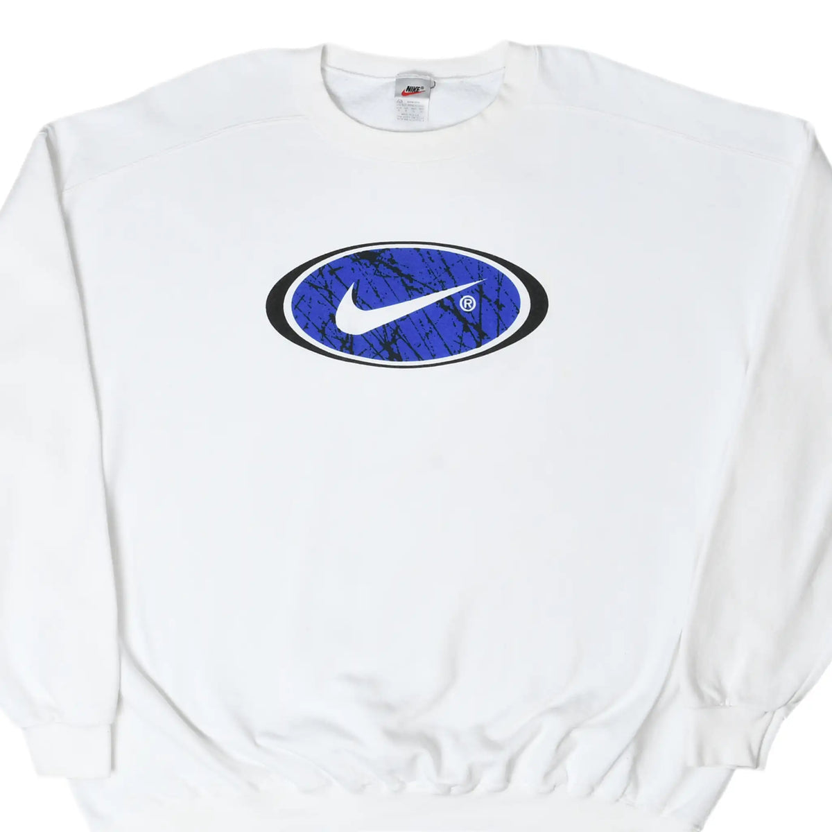 Front of white Nike sweatshirt with a large white Swoosh in a blue and black oval chest graphic